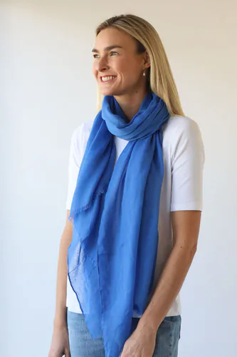 Model wearing Bright Blue Vibrant Plain Scarf By Archer House Available at Beetees Nelson